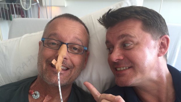 Neil Pennock (right) with his late partner Trace Richey, who died after a transplant failure.