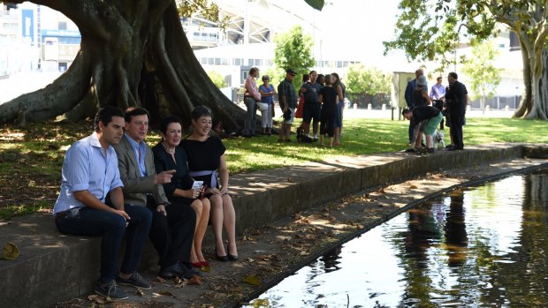 Alex Greenwich, Ron Hoenig, Clover Moore and Jenny Leong at Kippax Lake on Wednesday.