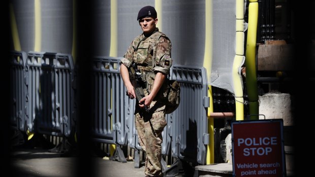Armed troops are guarding vital locations after the official threat level was raised in Great Britain.