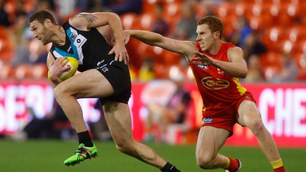 Gold Coast and Port Adelaide will play for premiership points in China.