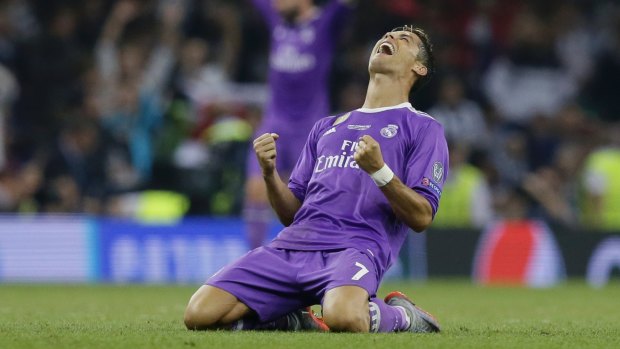 At the double: Cristiano Ronaldo celebrates after the final whistle.