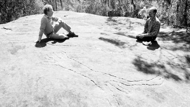 Authors of the Field Guide To Aboriginal Rock Engravings, Peter Stanbury and John Clegg, take the SMH on a tour of engravings in Sydney's north in 1990.