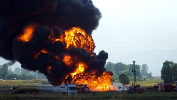 Revealed as a cyber attack: Firemen struggle to extinguish the fire at the Baku-Tbilisi-Ceyhan pipeline near the eastern Turkish city of Erzincan on August 7, 2008. 