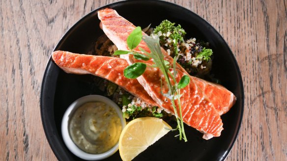 Fresh produce on show: perfectly cooked salmon perched atop grain salad.