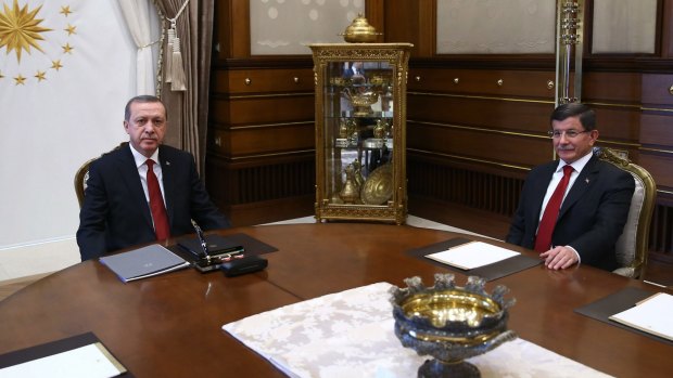 Turkish President Recep Erdogan and Prime Minister Ahmet Davutoglu at the presidential palace.