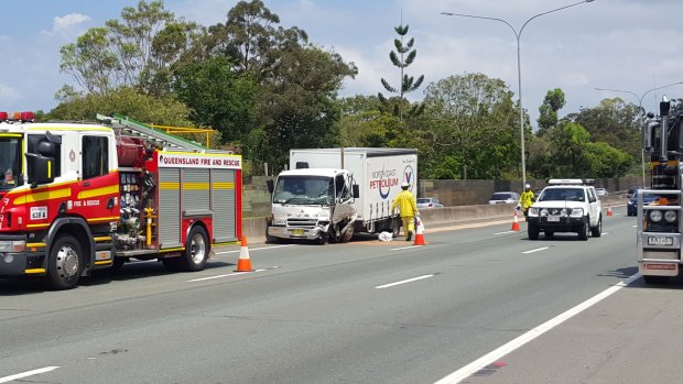 A damaged truck following an accident in the northbound lanes of the Pacific Motorway, south of the Gateway Motorway exit.
