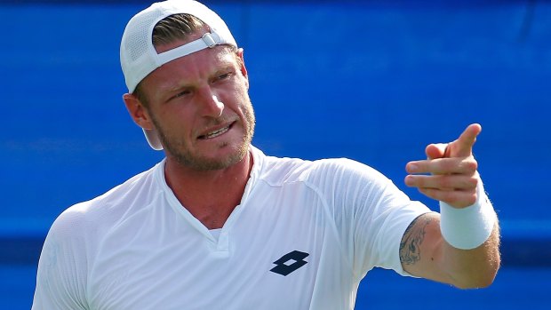 Groth reacts during his match against Frances Tiafoe.