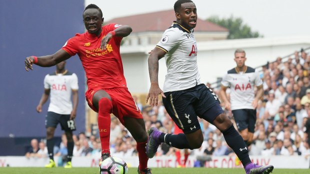 Liverpool's Sadio Mane competes for the ball with Tottenham's Danny Rose.