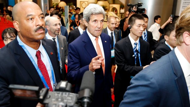 US Secretary of State John Kerry during the G20 Summit in Hangzhou on Sunday. Mr Kerry emerged briefly to announce a ceasefire had yet to be agreed.