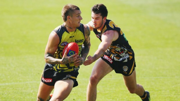Dustin Martin tries to evade Corey Ellis during Richmond's intraclub match on Friday.