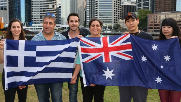 Brisbane residents rally on Saturday to back Greece (from left) Georgina Baveas, John Savva,  Antony Condoleon, Dimitra Baveas, Jason Kim and Victoria Chen.