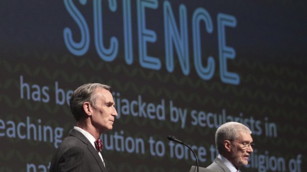 Battle of ideas: creation Museum head Ken Ham, right, speaks during a debate on evolution with TV's "Science Guy" Bill Nye. Ham believes the Earth was created 6000 years ago by God and is told strictly through the Bible. Nye is worried the U.S. will not move forward if creationism is taught to children. 