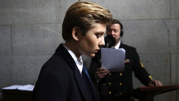 Little boy lost: Donald Trump's son Barron Trump arrives to see his father sworn in as president.