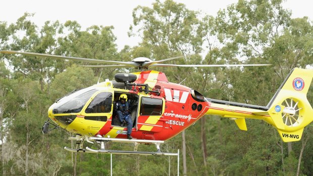 The helicopter landed on the school oval. 