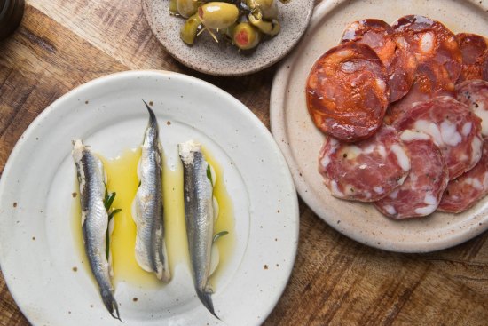 Stuffed olives, charcuterie and white anchovies at Harvest.