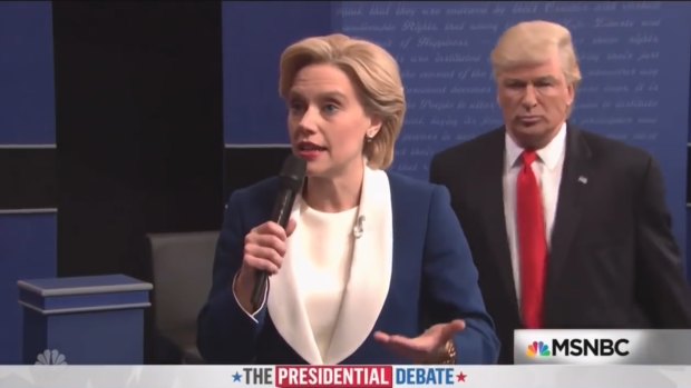 Kate McKinnon and Alec Baldwin mocked the recent debate where Trump was seen looming over Clinton.