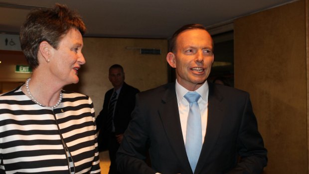 Business Council president Catherine Livingstone talks with Prime Minister Tony Abbott.