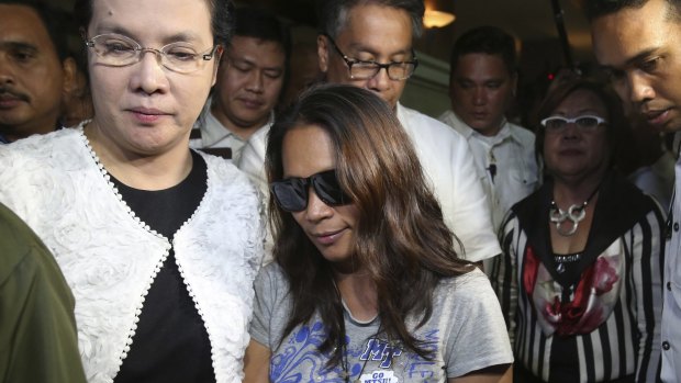 Maria Kristina Sergio, centre, the alleged recruiter of convicted Filipino drug trafficker Mary Jane Veloso.