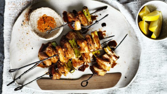 Schembri sprinkles the seasoning (top left) over yakitori skewers.