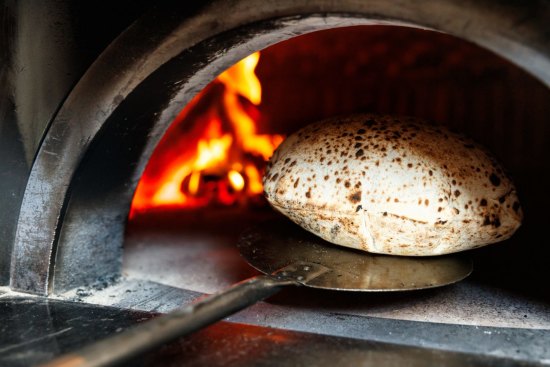Wood-fired bread at Bar Totti's in Sydney.