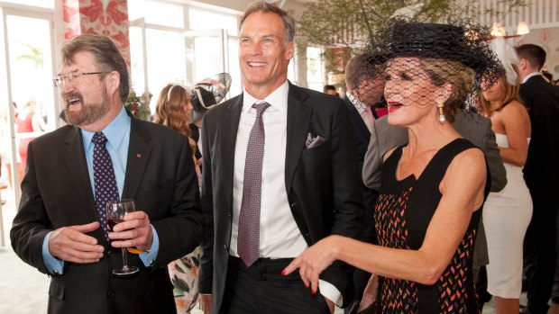Birds of a feather ... Senator Derryn Hinch (left) with Julie Bishop and David Panton, at the Melbourne Cup. 