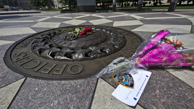 A tribute left at the National Law Enforcement Officers' Memorial in Washington on Friday.
