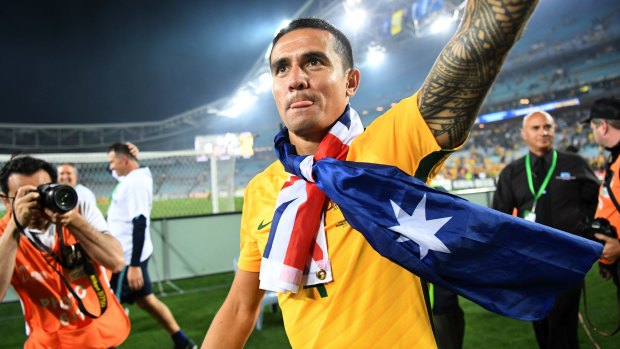 Tim Cahill celebrates after the Socceroos' qualified for the World Cup.