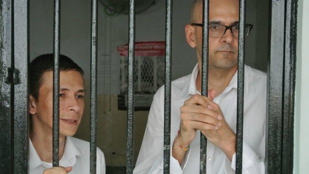 Indonesian teacher's aide Ferdinant Tjiong (left) and Canadian teacher Neil Bantleman had their prison sentences reinstated in February.