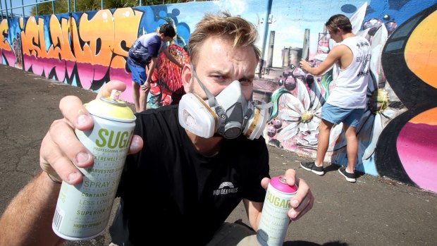 Street artist Scott Marsh has gone from tagging trains to council-approved mural art.