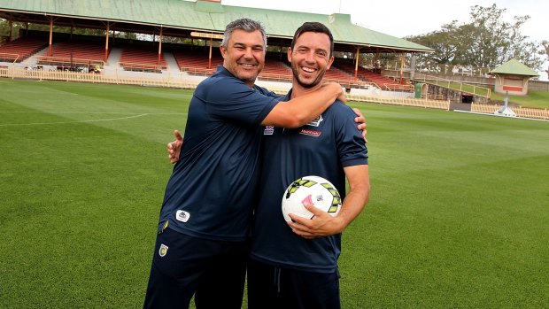 In happier times: Phil Moss with Mariners captain  John Hutchinson in December last year.