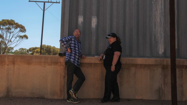 Patient Pete, 49, chats with mental health project officer Glynis Thorp outside an old corrugated iron shed. 
