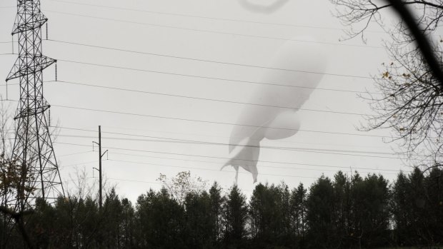 An unmanned US Army blimp drags a tether line south of Millville in Pennsylvania.