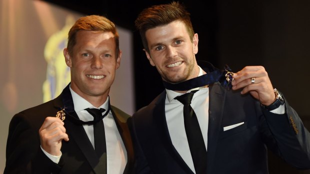 The new medallists: Sam Mitchell and Trent Cotchin.