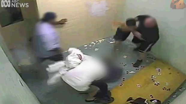 Youths are manhandled by corrections system staff in the ABC footage.