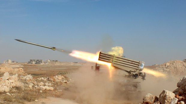 Syrian rebels launch missiles against Syrian government forces near Aleppo.