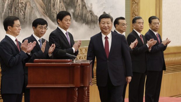 Chinese President Xi Jinping with other members of the Communist Party's new Politburo Standing Committee Han Zheng, from left, Wang Huning, Li Zhanshu, Li Keqiang, Wang Yang and Zhao Leji.