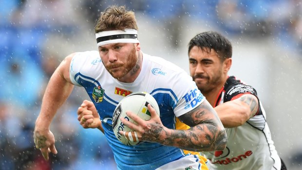 Before it all went wrong: Chris McQueen gets past Shaun Johnson last season.