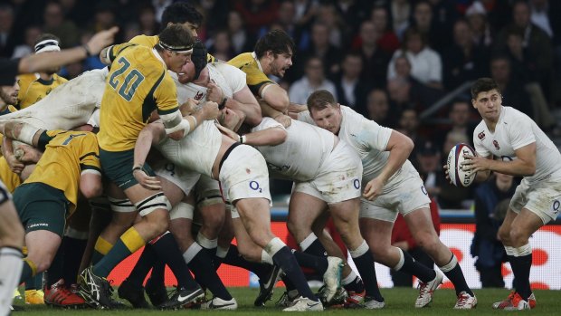 Mauled: The Australian pack were smashed by their English rivals.