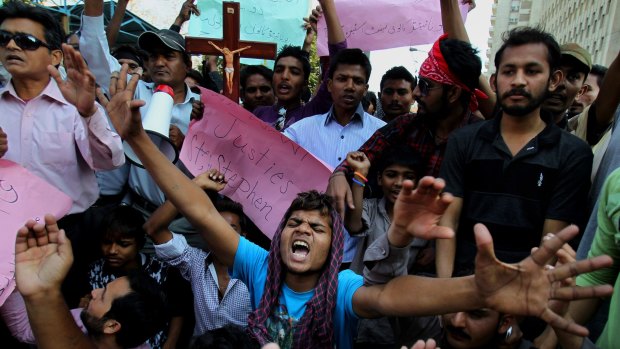Pakistani Christians in Karachi chant slogans during a demonstration to condemn the suicide bombing attack on two churches in Lahore. 