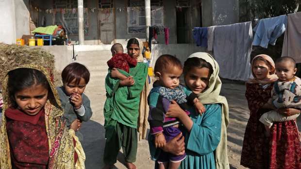 Displaced girls in a makeshift camp last month after their families fled an increasingly vicious war for control of Afghanistan's eastern region between the Taliban and Islamic State fighters.