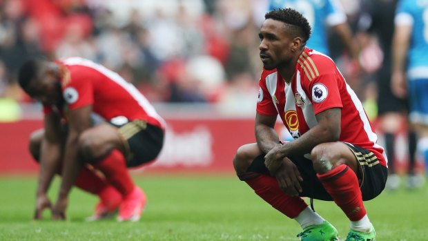 A dejected Jermain Defoe after Sunderland's loss confirmed their relegation.