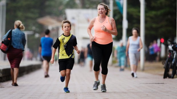 Annie White and her son Oli have been running along Manly Beach to get in shape for the big race.