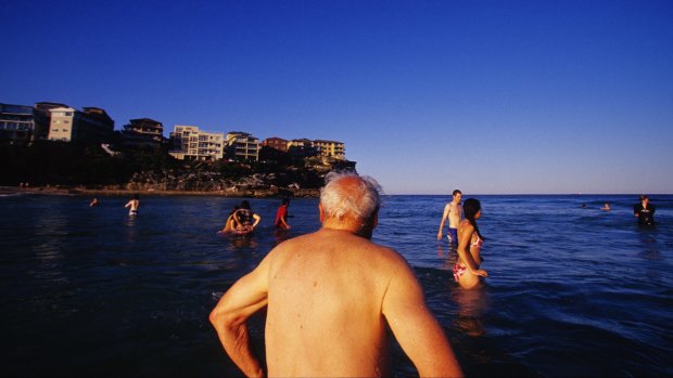An elderly man swims at Queenscliff on Sydney's northern beaches. 