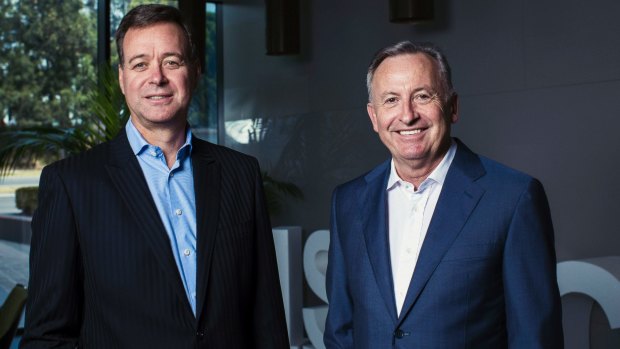 Aristocrat CEO Trevor Croker (left) with former chief Jamie Odell .