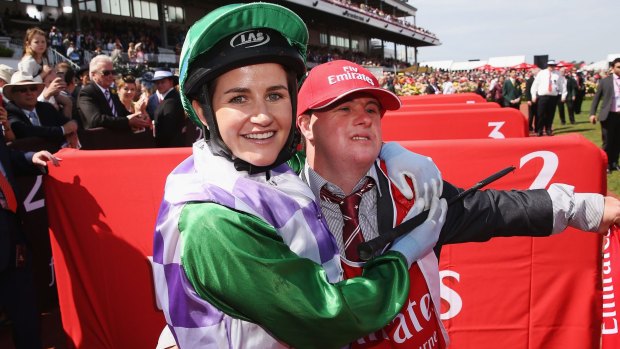 Michelle Payne celebrates with brother Stephen after the Melbourne Cup.