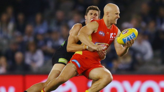 Gary Ablett, shaking off Marc Murphy, was pivota' in Gold Coast's defeat of Carlton.