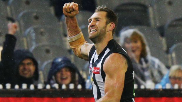 Recalled to the side to play the Dockers, Travis Cloke celebrates a goal for Collingwood at the MCG last Friday.