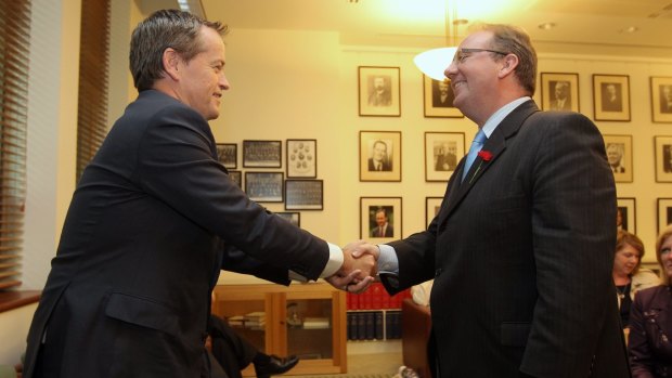 Happier times: Opposition Leader Bill Shorten congratulates David Feeney at the Labor caucus.  