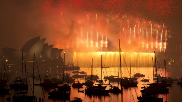 The bridge explodes in a dramatic fireworks display.