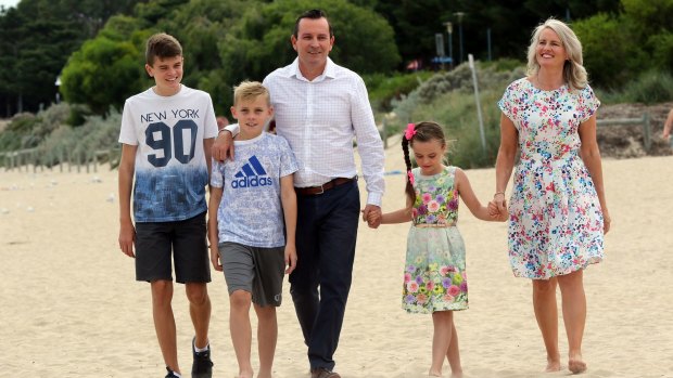 WA's next premier, Mark McGowan, on Rockingham Beach, near Perth, with his wife Sarah and children Samuel, 13, Alexander, 11, and Amelia, 7, on Sunday.
